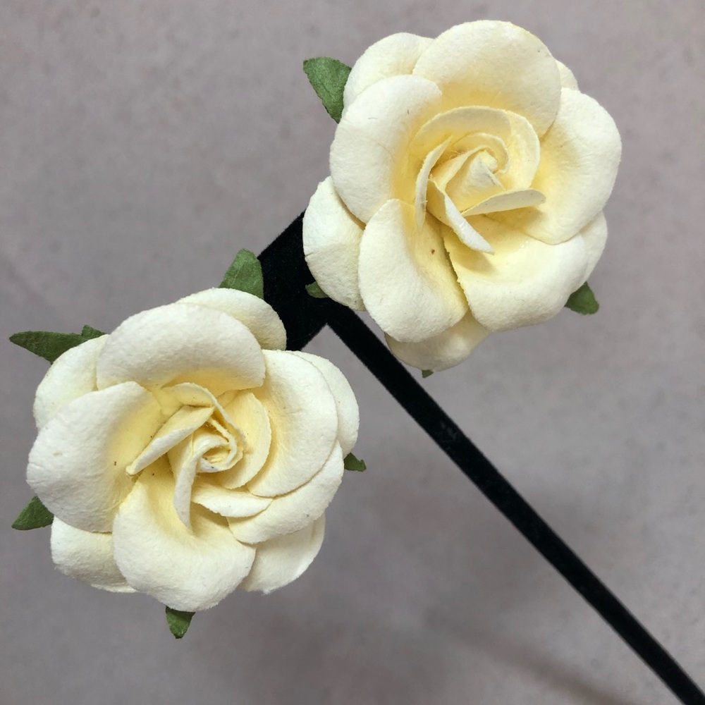 Pale yellow floral clip on earrings